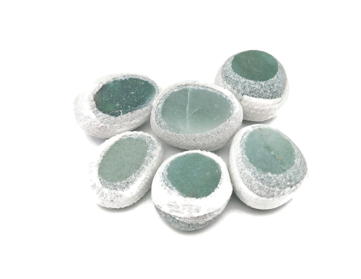Aventurine seer tumbled river stone from GemstoneGO, showcasing smooth green gemstone with natural stone textures and earthy tones.
