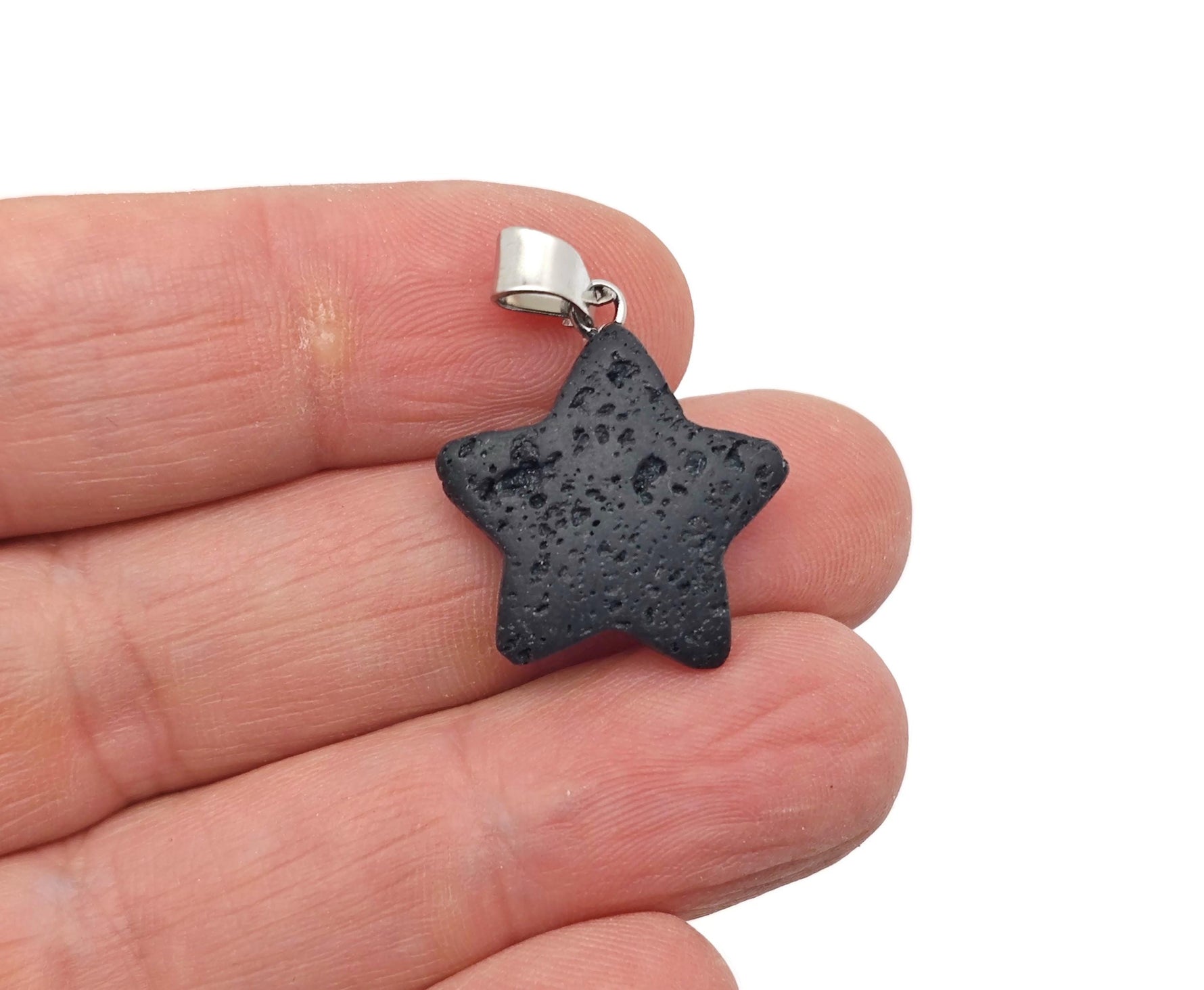 Lava Star Crystal Pendant from GemstoneGO featuring a spiritual stone with a star-shaped design and lava stone accents.