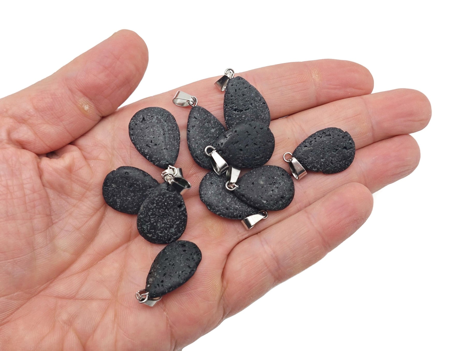 Lava crystal pendant featuring a spiritual stone design from GemstoneGO, showcasing a black volcanic stone pendant on a necklace.