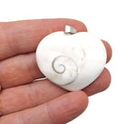 Shiva shell heart-shaped gemstone pendant from GemstoneGO featuring a polished natural shell design on a silver chain