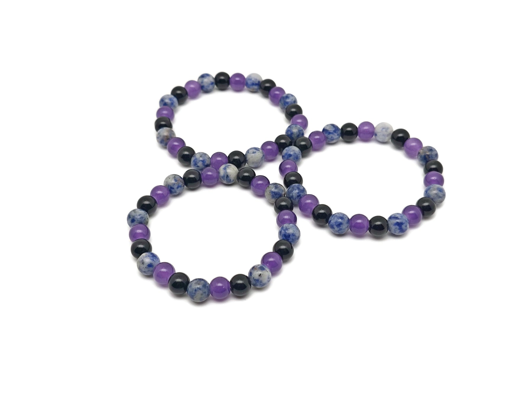 Handmade gemstone intention bracelet with smooth beads in calming colors, designed for soothing and positive energy.