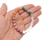 Handmade Power Gemstone Bracelet by GemstoneGO featuring colorful polished stones and a beaded design for positive intention.