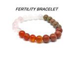 Handmade fertility gemstone bracelet with colorful beads and adjustable cord from GemstoneGO, designed to enhance positive intentions.
