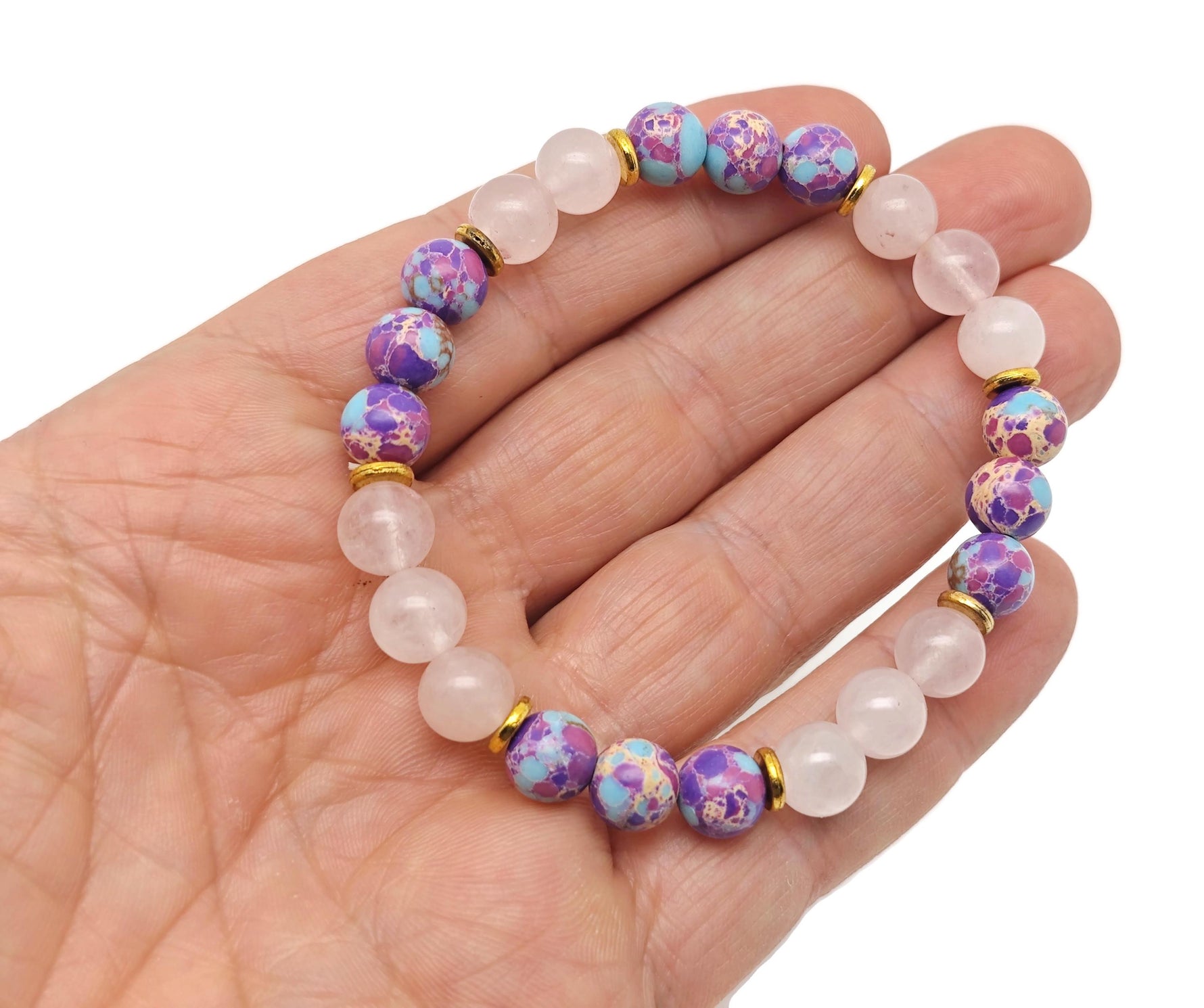 Handmade gemstone bracelet with colorful beads, featuring a charm; designed as an intention bracelet by GemstoneGO.