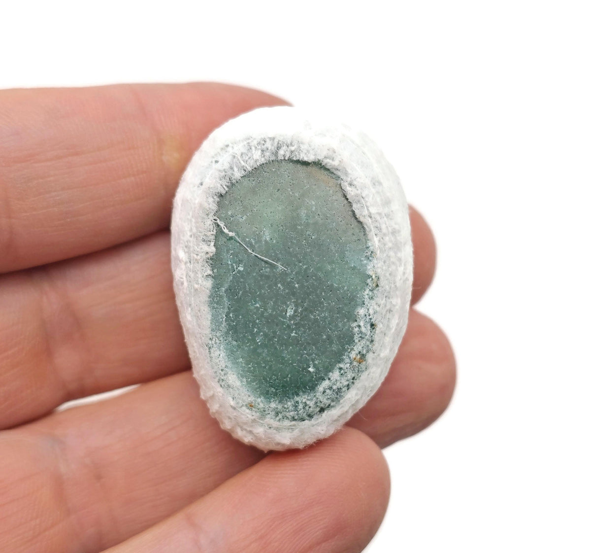 Aventurine seer tumbled river stone from GemstoneGO showcasing smooth, polished green gemstone with natural patterns and earthy tones.