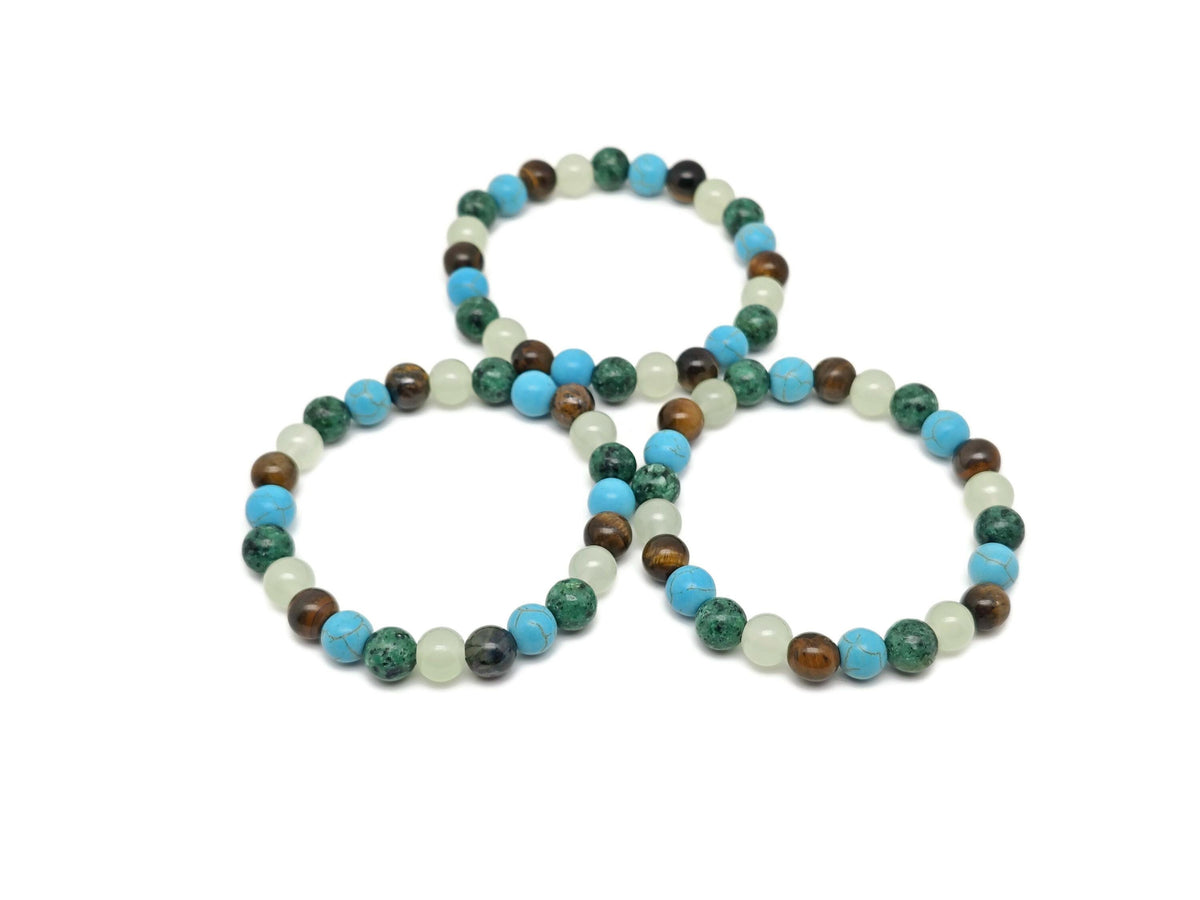 Handmade crystal healing gemstone bracelet with colorful beads, designed for intention and positive energy.