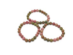 Handmade gemstone bracelet with colorful beads for stress relief and positive intentions, designed by GemstoneGO.