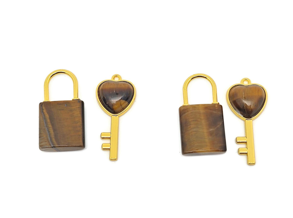 Tiger Eye heart crystal pendant by GemstoneGO featuring a polished tiger eye stone in a heart shape with a silver bail.