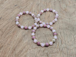 Handmade empowerment gemstone bracelet with colorful beads and charms, designed to inspire positive intentions and self-confidence.