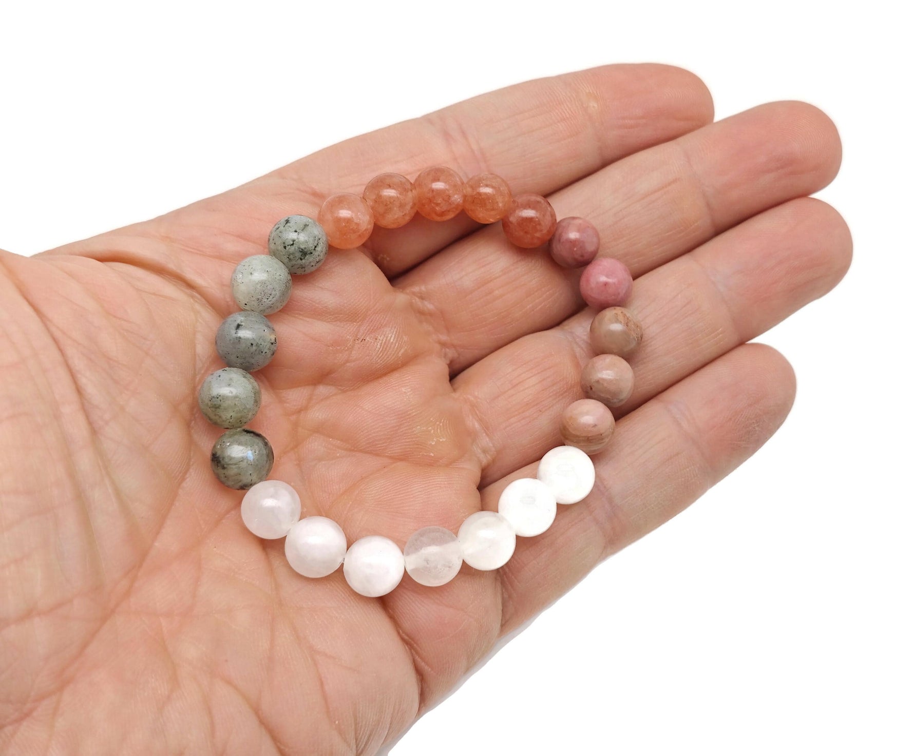 Handmade self-love gemstone bracelet with colorful beads, designed for positive intentions and personal empowerment by GemstoneGO.