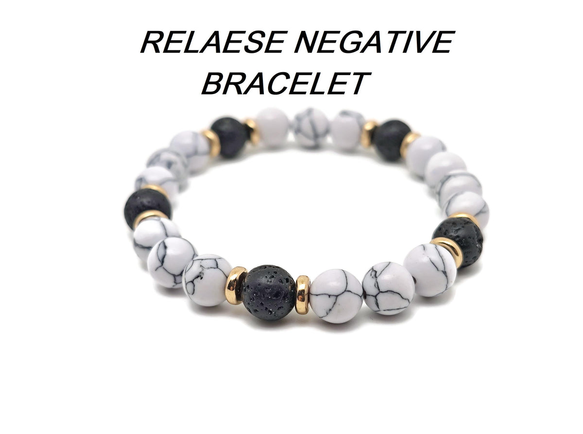 Handmade gemstone bracelet with negative energy-releasing stones, featuring colorful beads and a secure clasp by GemstoneGO.