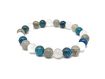 Handmade gemstone bracelet with colorful beads and natural stones, designed for self-care and positive intentions.