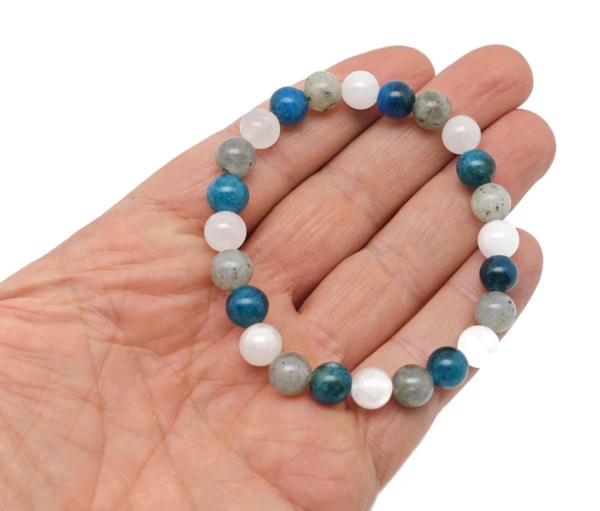 Handmade gemstone self-care bracelet with colorful beads and intention charms, designed for wellness and mindfulness.