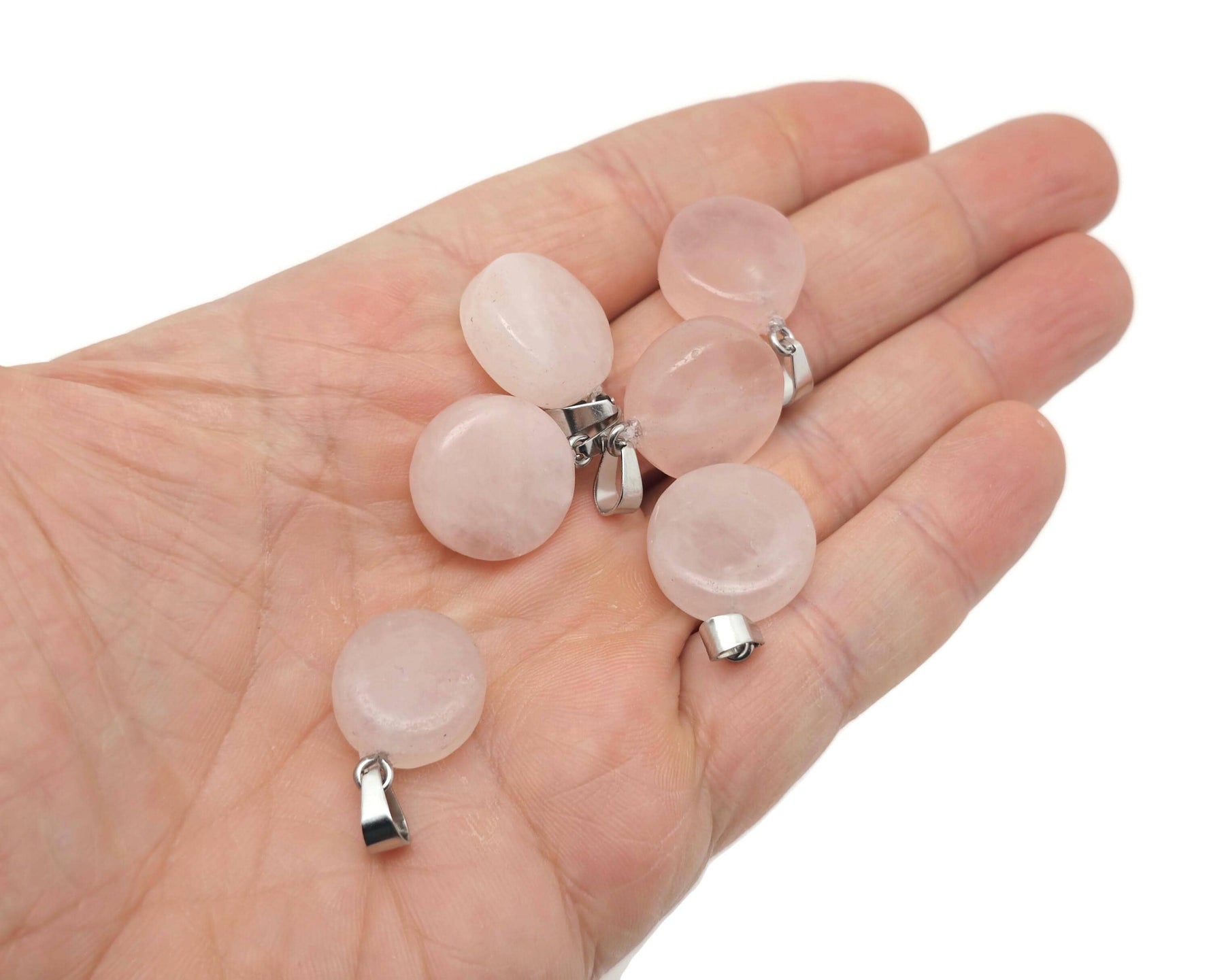 Rose Quartz flat round gemstone pendant with crystal coin design from GemstoneGO, showcasing a smooth, polished pink stone.