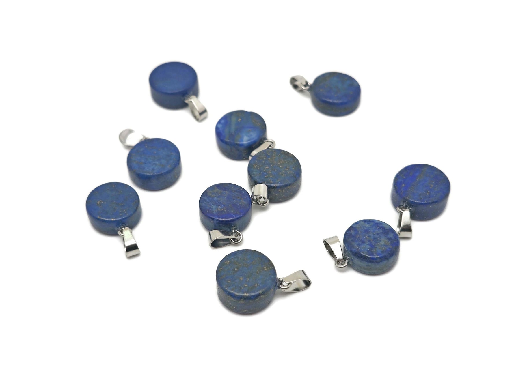 Lapis Lazuli flat round gemstone pendant with a crystal round coin design, featuring deep blue and gold flecks, by GemstoneGO.