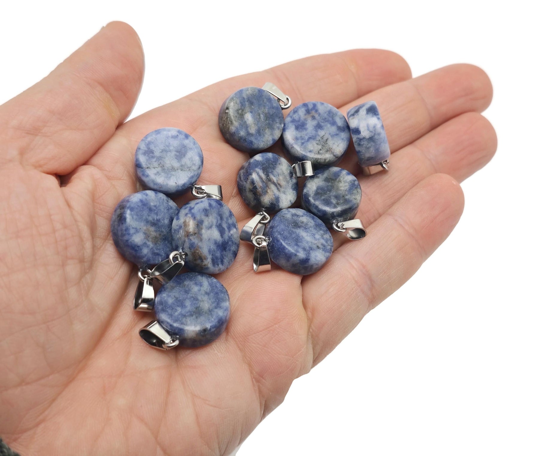 Round Sodalite gemstone pendant with flat coin shape, featuring deep blue and white mineral patterns, jewelry piece from GemstoneGO.