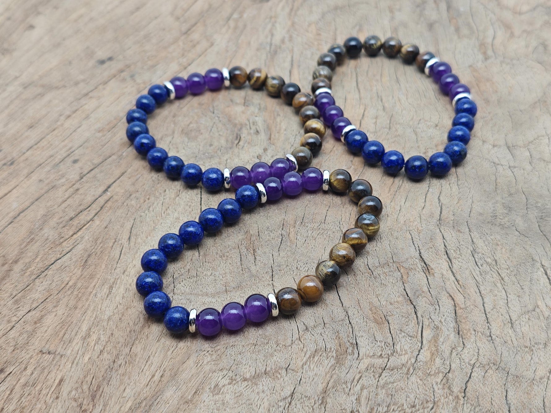 Handmade gemstone anxiety bracelet with natural stones and intention charms, designed for calming and stress relief.
