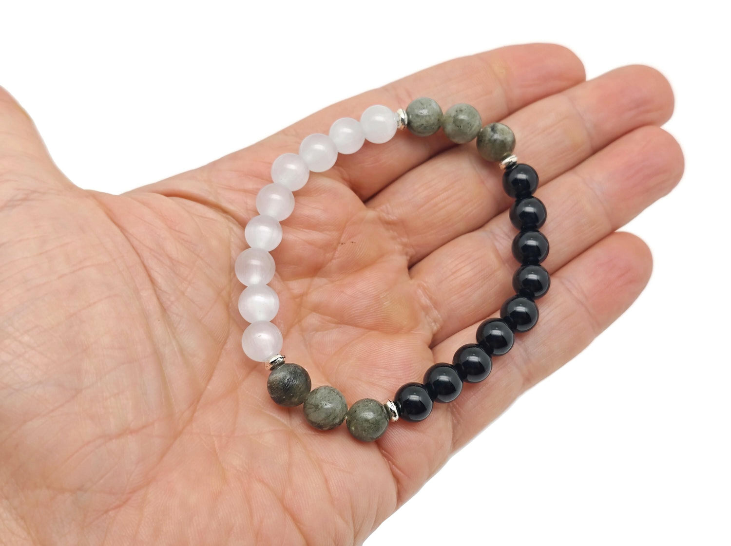 Handmade gemstone protection bracelet with colorful stones, designed for positive energy and intention by GemstoneGO.