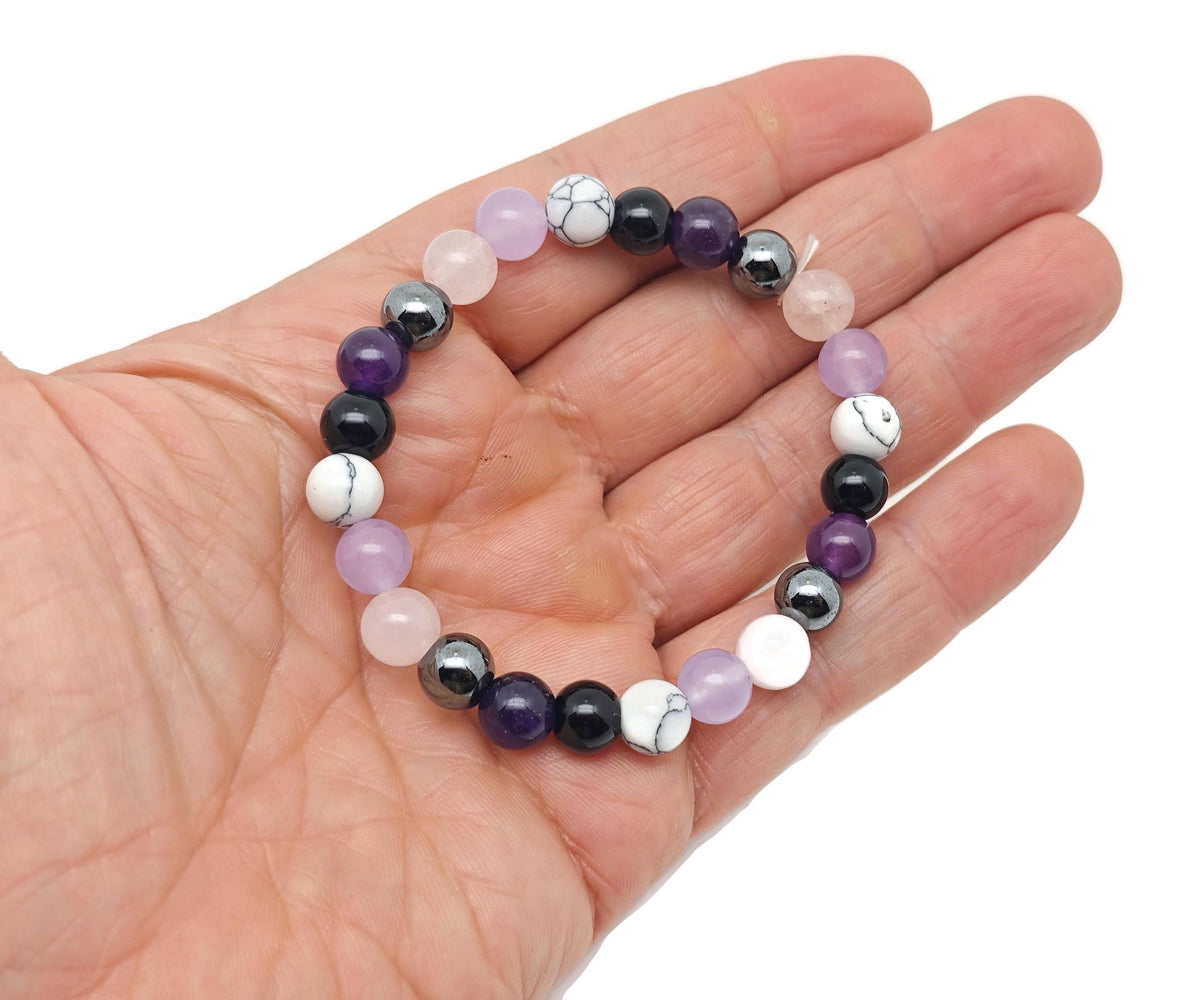 Handmade calming gemstone bracelet featuring smooth natural stones, designed for intention and mindfulness.