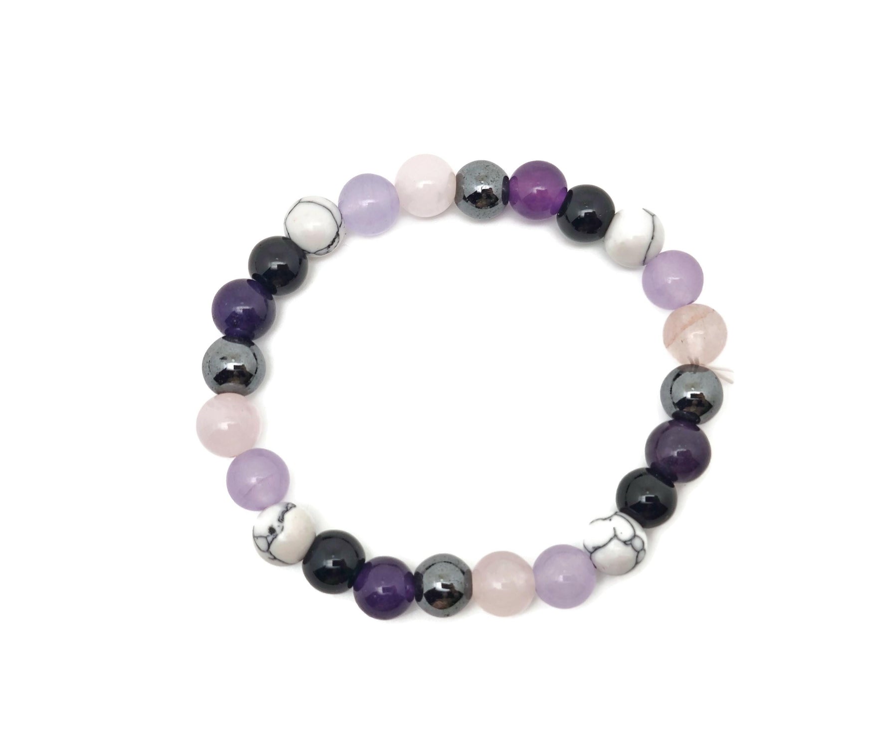 Handmade Calming Gemstone Bracelet by GemstoneGO featuring smooth, colorful gemstones on an elastic band for relaxation and intention.