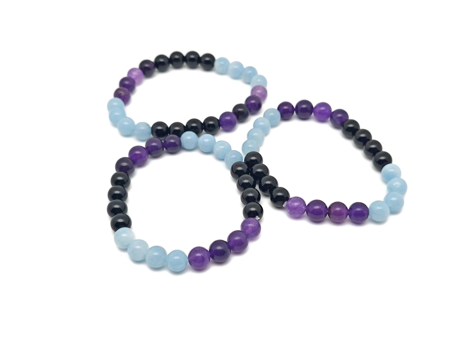 Handmade gemstone bracelet with colorful stones, designed for pain relief and positive intentions, by GemstoneGO.