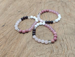 Handmade Love and Attract gemstone bracelet with colorful beads, intended for positive intention and attraction, by GemstoneGO.