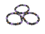 Handmade gemstone bracelet by GemstoneGO featuring colorful beads and an adjustable design, intended for positive intentions.