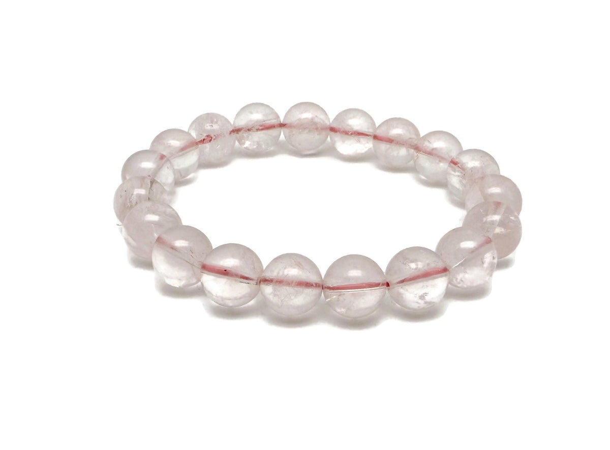 Rose quartz beaded crystal bracelet for men and women with stretchy design, ideal for crystal healing and stylish accessories.