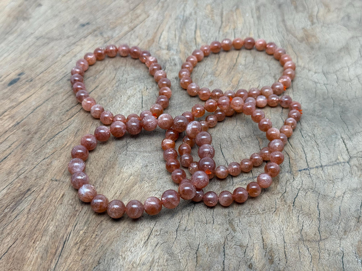 Beaded crystal healing bracelet for men and women with stretchy band, featuring polished AA-grade crystals from GemstoneGO.
