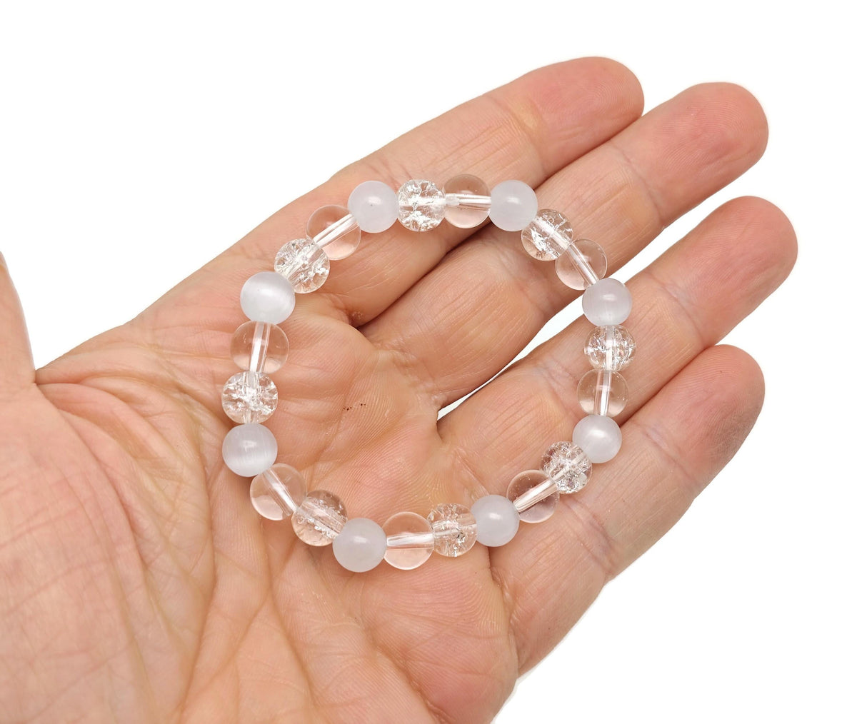 Handmade gemstone bracelet for emotional balance featuring colorful stones on a stretchy cord, designed by GemstoneGO.