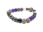 Handmade Triple Prosperity gemstone bracelet with colorful beads and natural stones, designed for positive intentions.