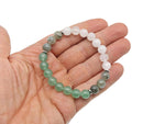 Handmade gemstone bracelet with lucky and fortune charms, featuring colorful beads and intricate details from GemstoneGO.