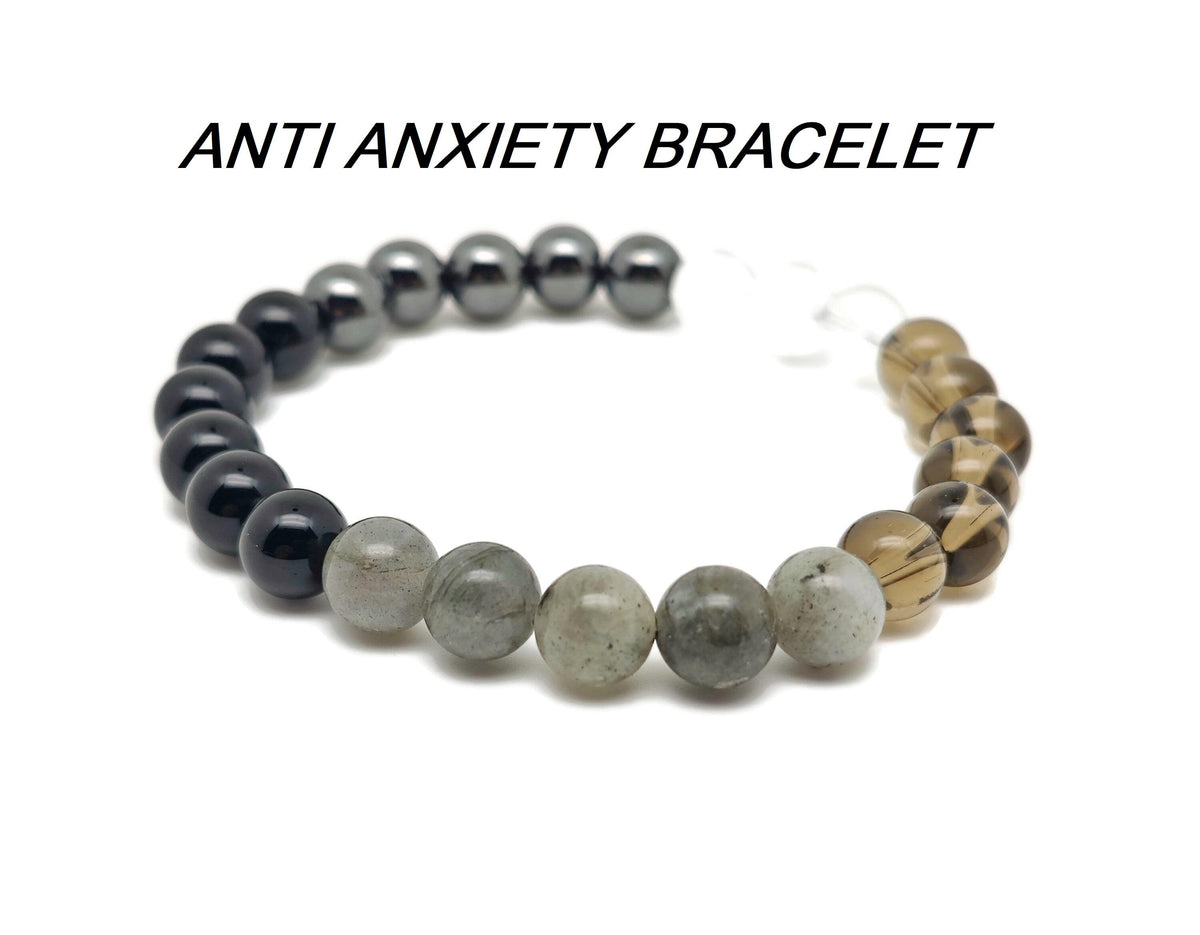Handmade anti-anxiety gemstone bracelet featuring colorful beads and a natural stone charm, designed for calming and intention setting.