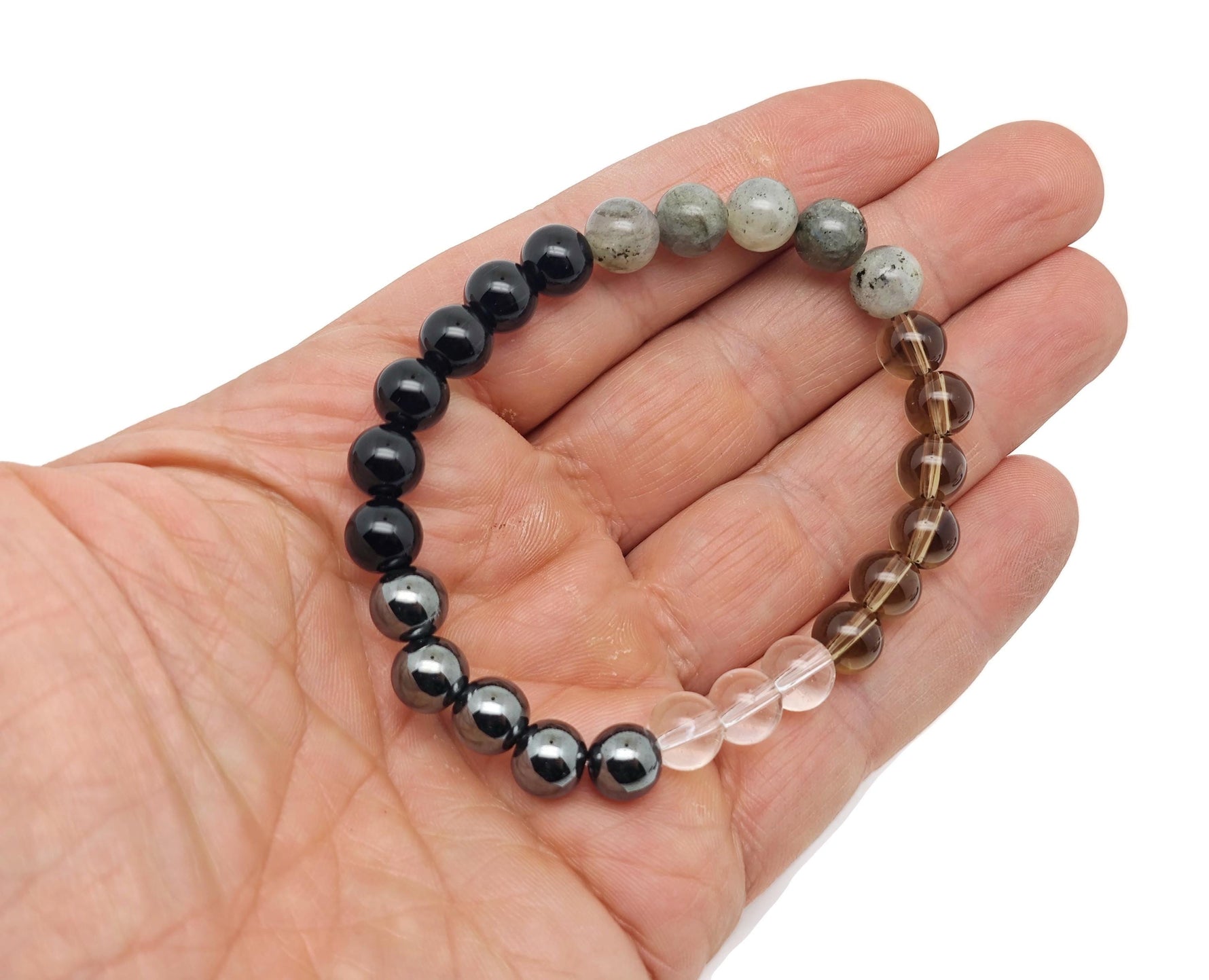 Handmade anti-anxiety gemstone bracelet by GemstoneGO featuring natural stones and adjustable cord for calming support.