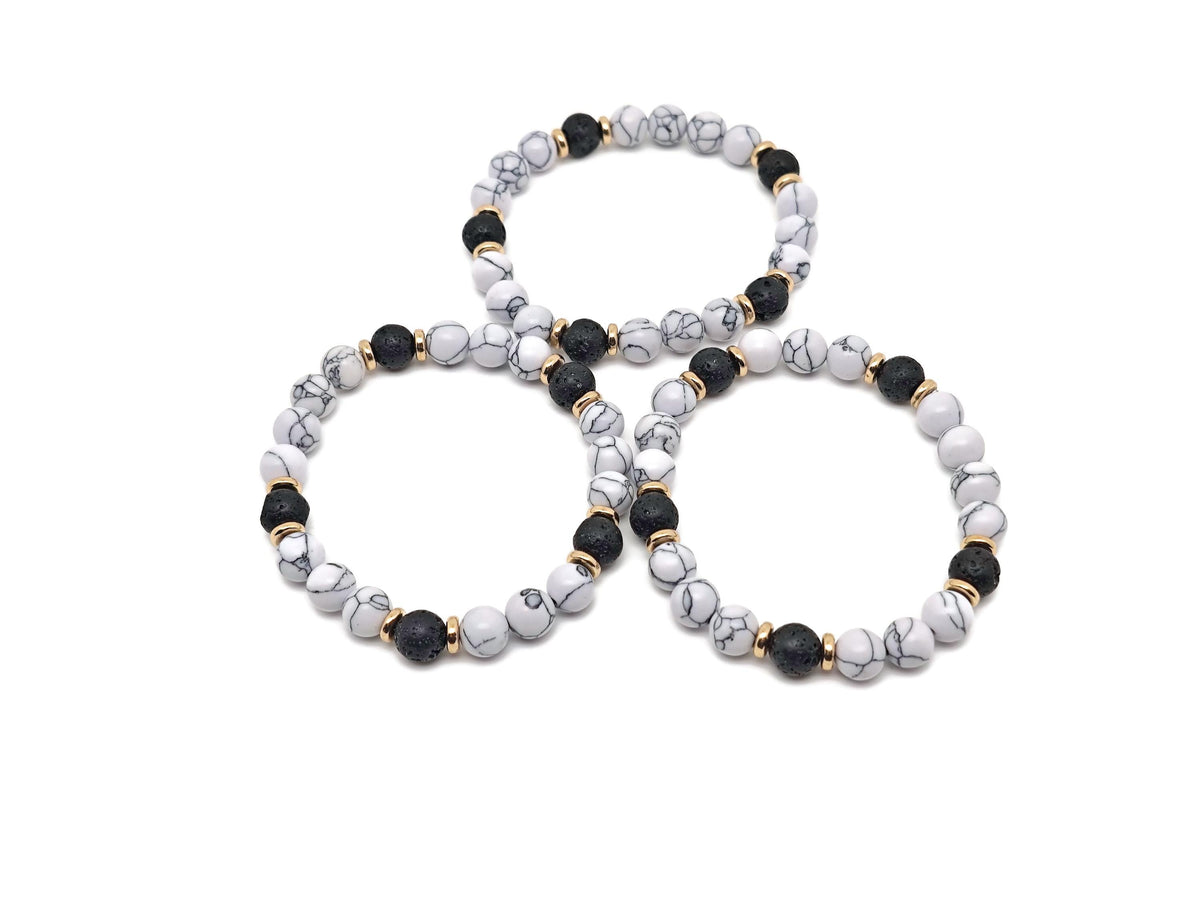 Handmade gemstone bracelet with negative energy release stones and natural beads, designed for positive intentions.