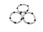 Handmade gemstone bracelet with negative energy release stones and natural beads, designed for positive intentions.