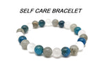 Handmade gemstone self-care bracelet with colorful beads and adjustable cord, designed for positive intentions and wellness.