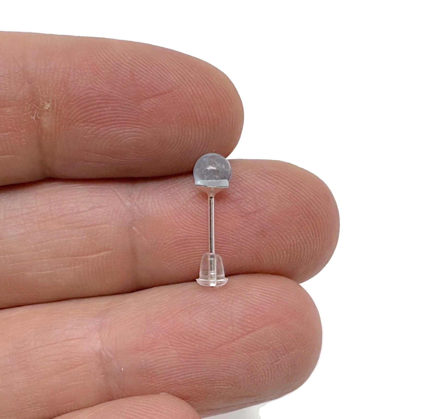 Sterling silver aquamarine stud earrings with sparkling crystal accents, featuring a beautiful blue gemstone setting.