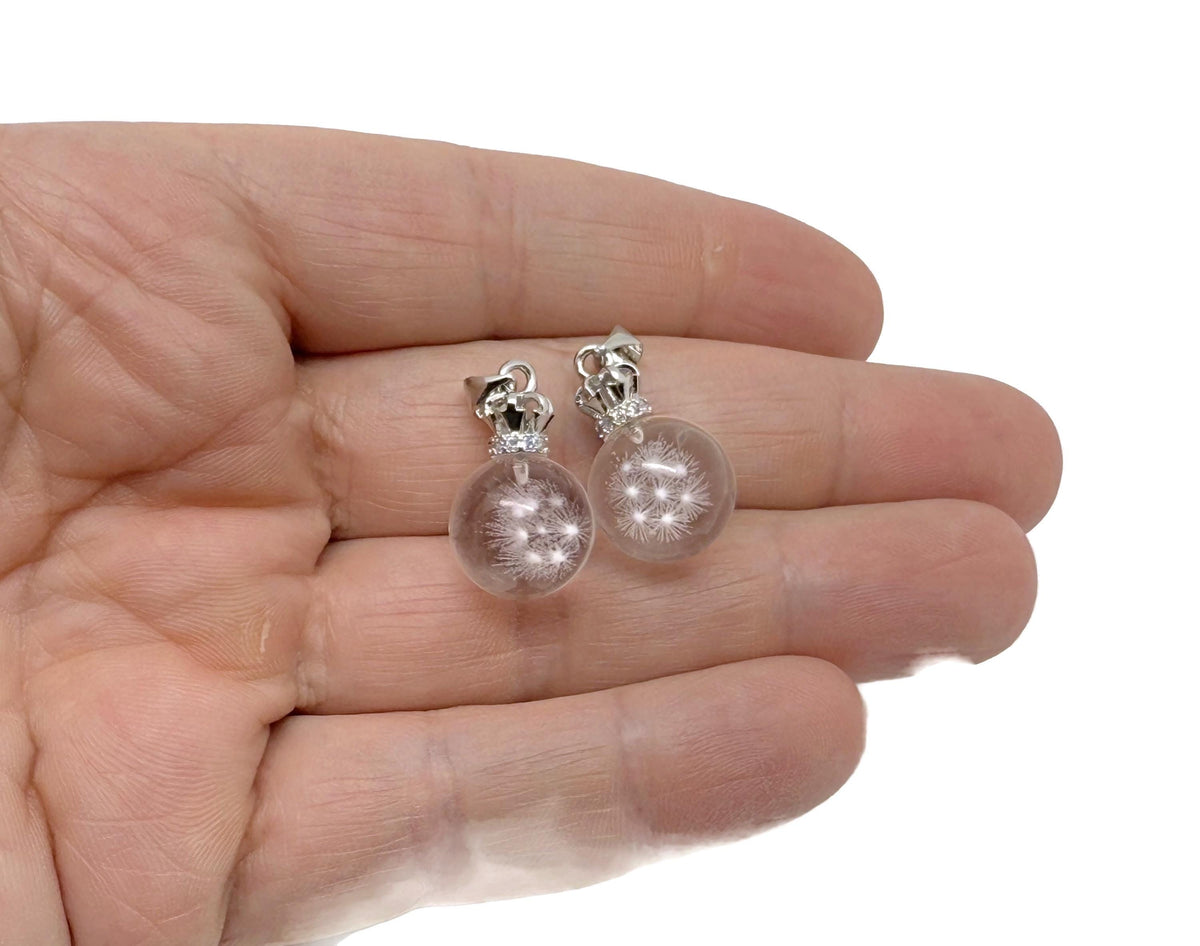Mini snowflake clear quartz crystal pendant by GemstoneGO, featuring a polished quartz ball with a delicate snowflake pattern.