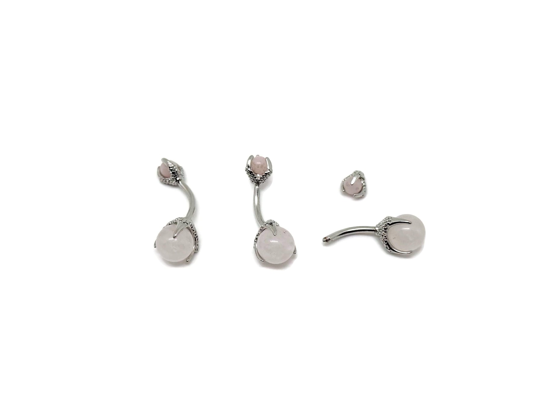 Rose quartz belly button ring with silver stainless steel, featuring a decorative navel piercing jewelry piece.