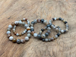 Stretchy Quartz Beaded Crystal Bracelet for men and women featuring polished AA-grade gemstones, ideal for crystal healing.