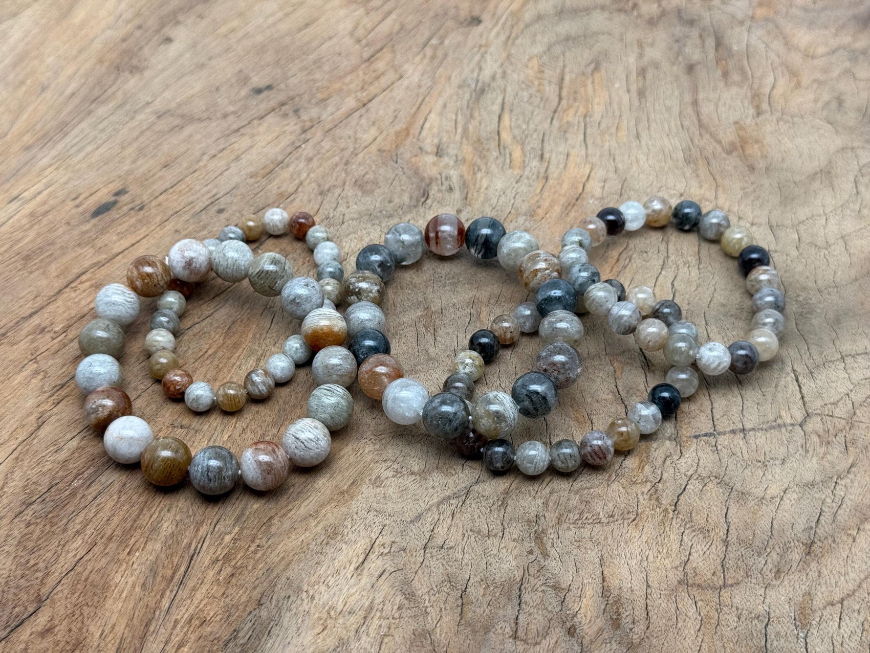 Stretchy Quartz Beaded Crystal Bracelet for men and women featuring polished AA-grade gemstones, ideal for crystal healing.