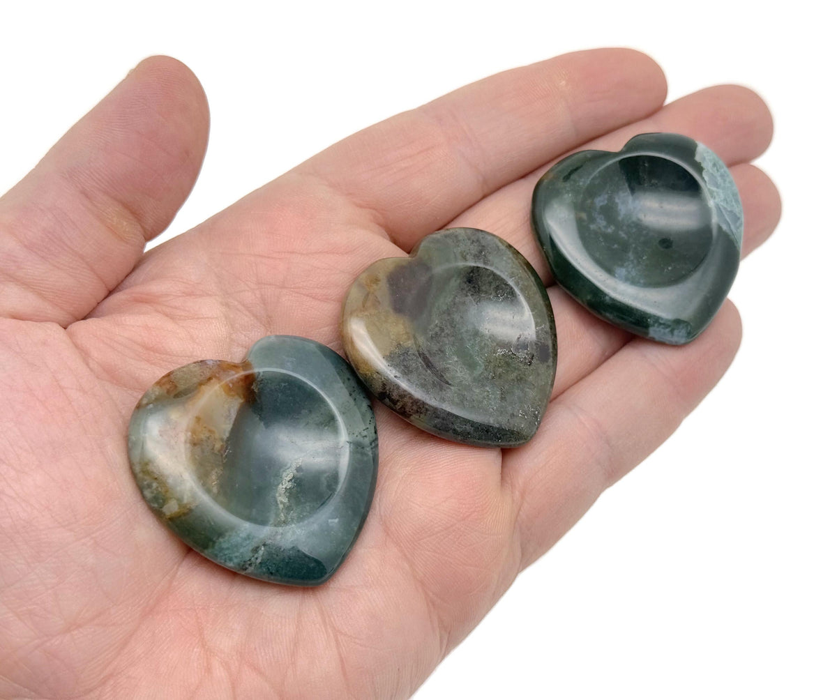 Natural crystal worry stone from GemstoneGO, soothing heart chakra crystal for relaxation, stress relief, and travel use.