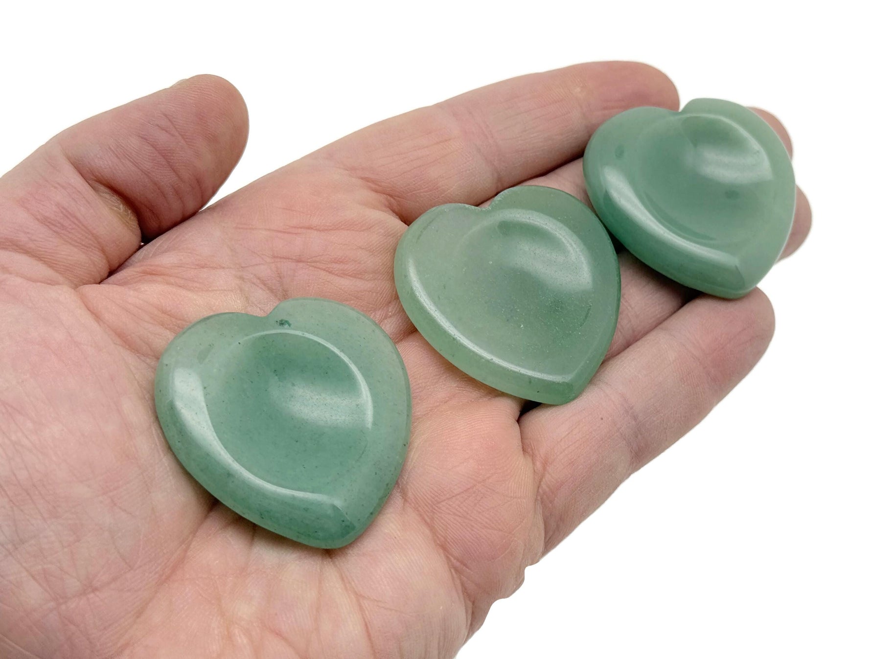 Natural crystal worry stone from GemstoneGO, soothing heart chakra crystal for relaxation, stress relief, and travel use.
