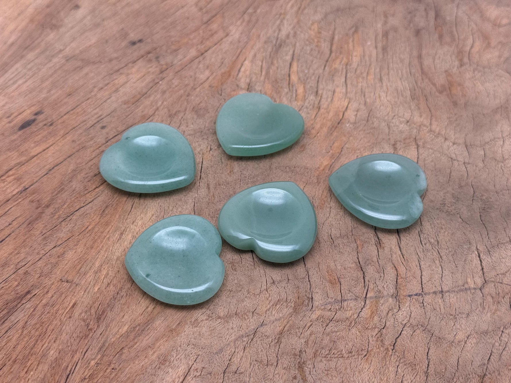 Aventurine heart-shaped worry stone from GemstoneGO, featuring a smooth, polished green crystal for calming and stress relief.