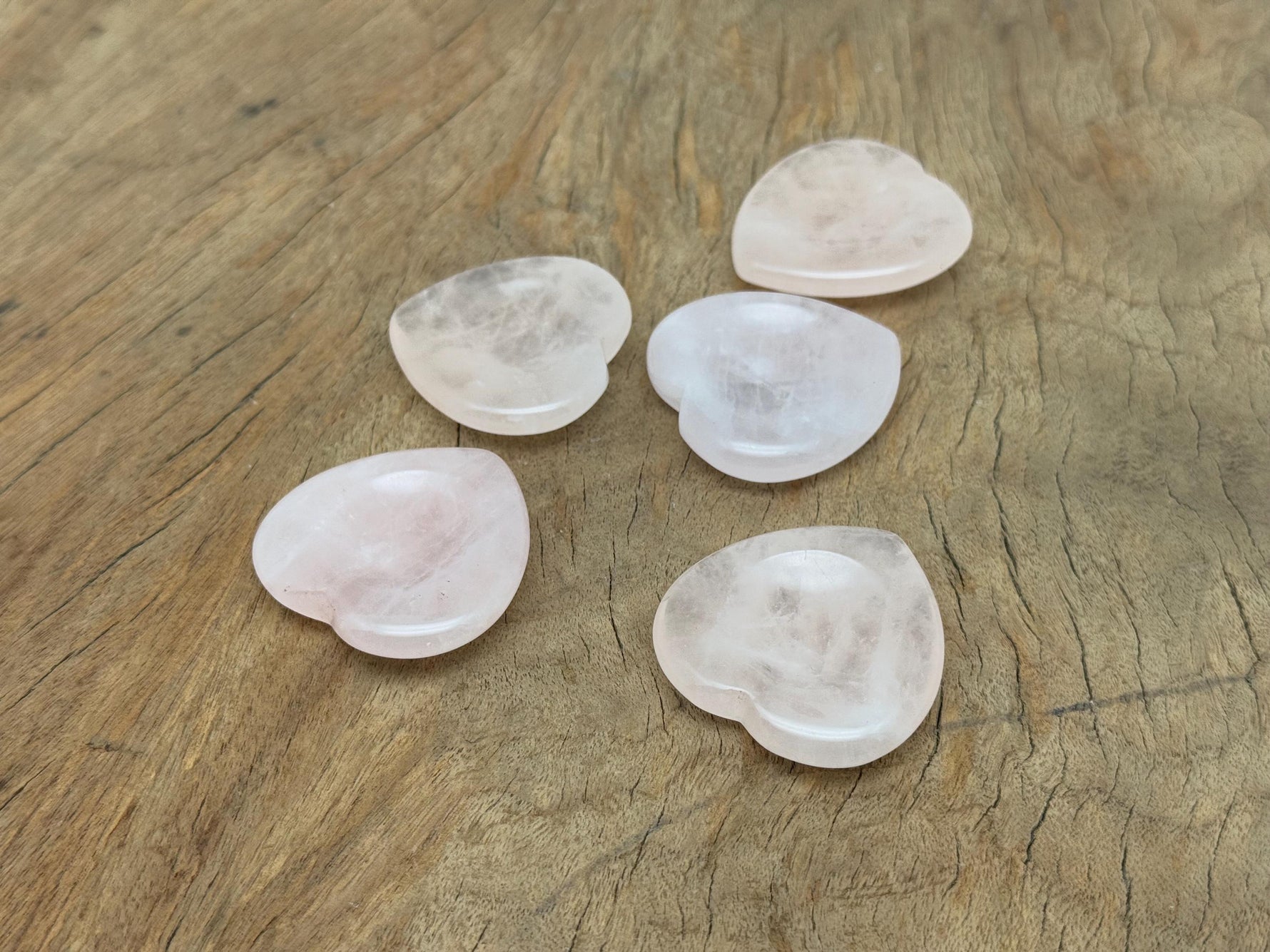 Rose quartz heart worry stone from GemstoneGO, featuring a smooth, soothing pink crystal heart for stress relief and meditation.