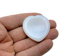 Opalite heart worry stone from GemstoneGO, soothing crystal with polished surface, used for stress relief and calming energy.