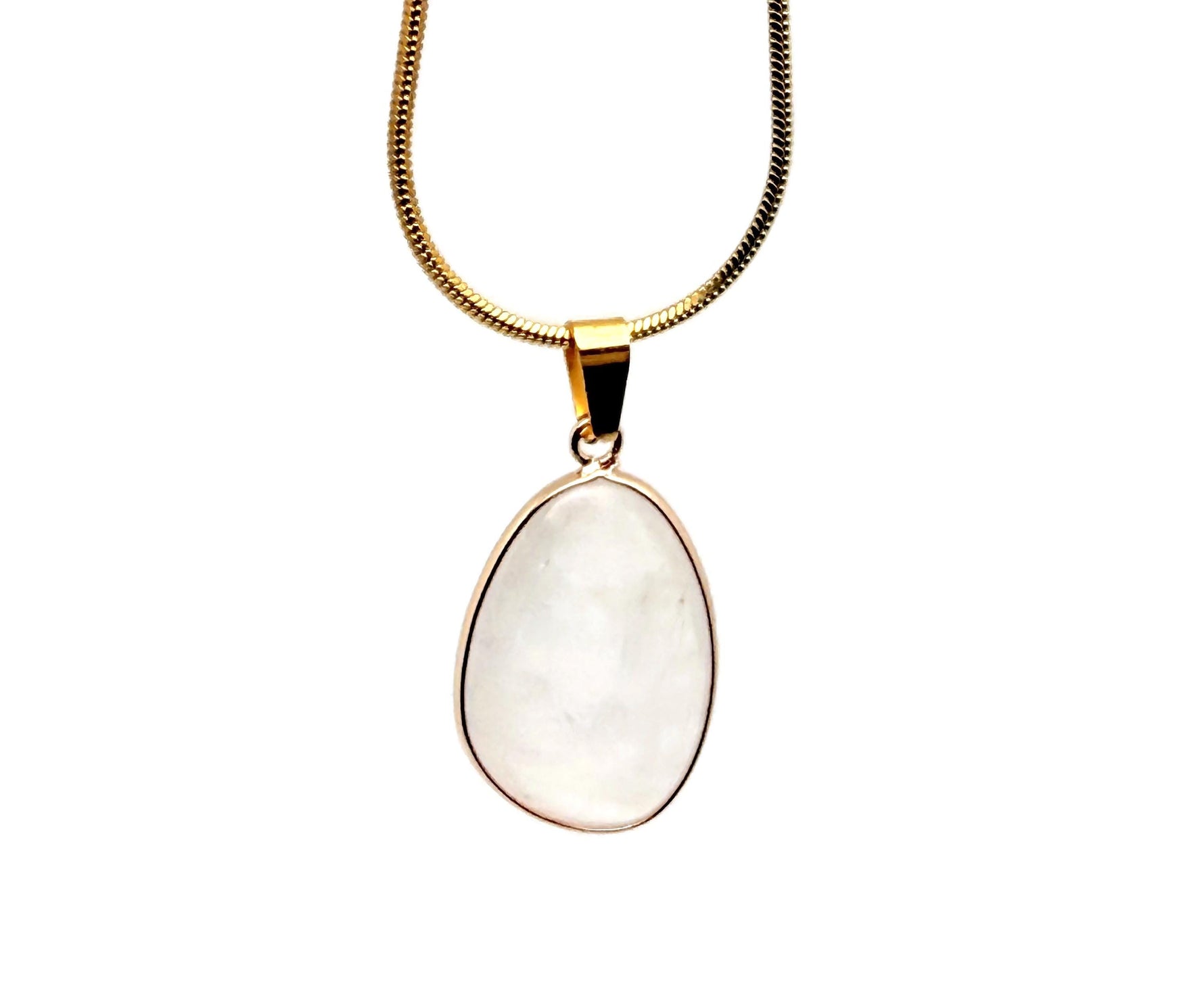 Dainty clear quartz gemstone pendant with gold setting, perfect for DIY jewelry charms, featuring a polished, transparent stone.