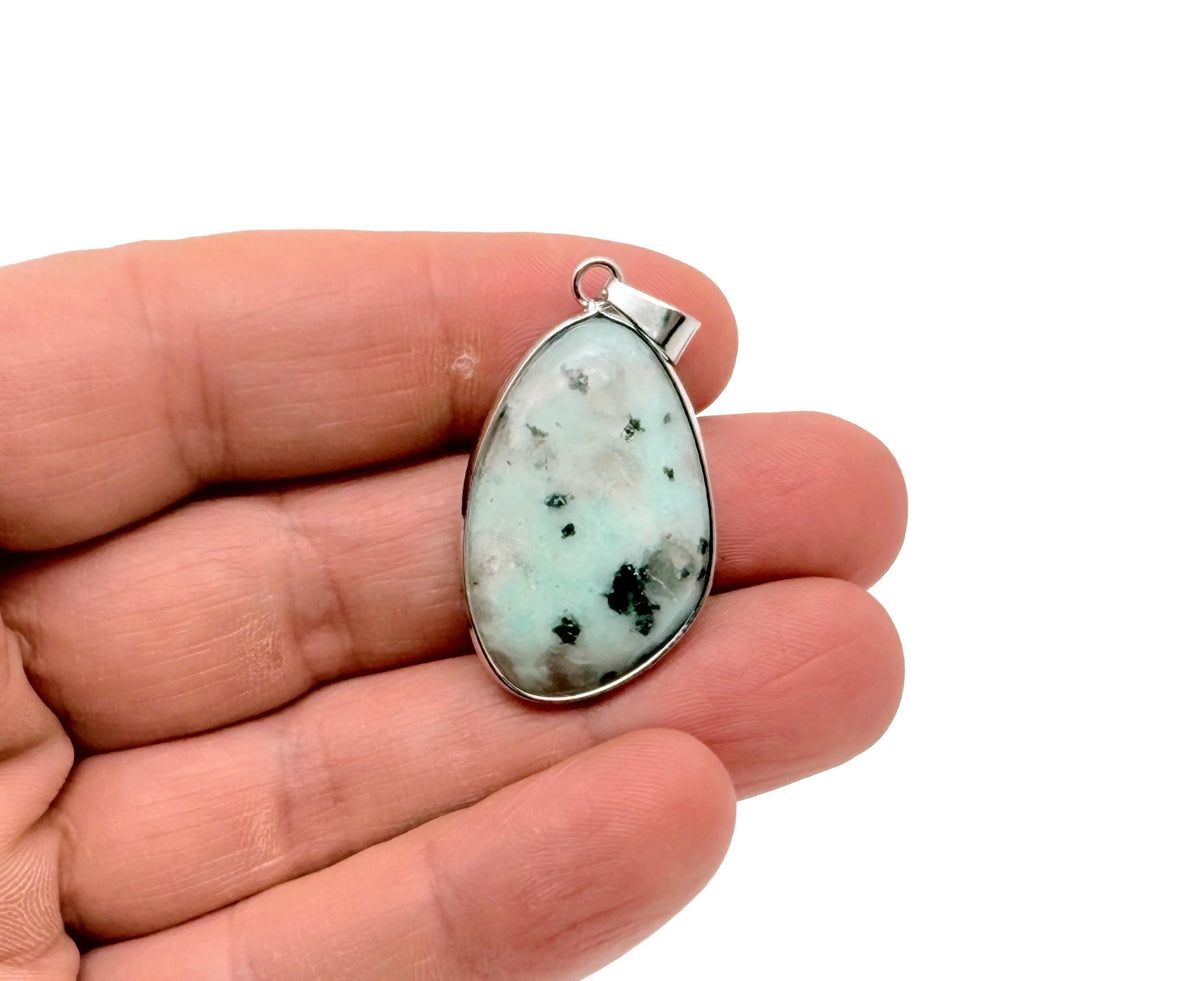 Dainty Kiwi Jasper silver gemstone pendant with silver chain, featuring a polished green and brown oval stone for jewelry making.