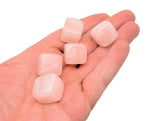 Handmade 16mm rose quartz cube stone, carved gemstone from GemstoneGO, displayed with natural pink hues and smooth facets.